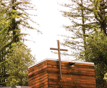 A cross on a building. Links to What to Give A cross on a building. Links to What to Give